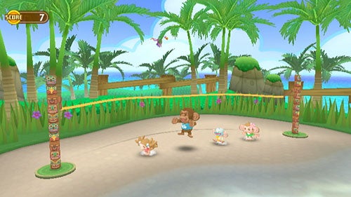 Screenshot of Super Monkey Ball: Banana Blitz gameplay showing a monkey character in a tropical setting surrounded by small rabbits, with a score of 7 displayed at the top.