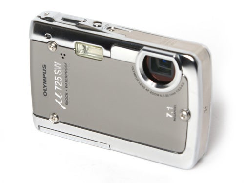 Olympus mju 725 SW digital camera in silver, featuring a 7.1-megapixel sensor, 3x optical zoom lens, and waterproof and shockproof design, displayed on a white background.
