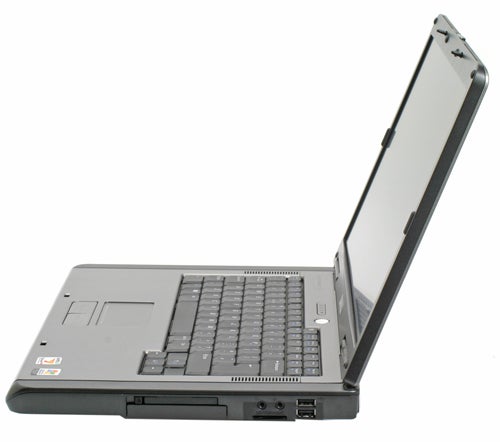 Dell Latitude 131L laptop with screen open at a right angle, showcasing the full keyboard and trackpad.