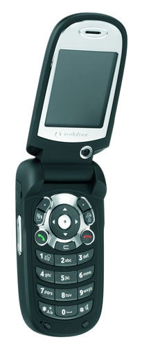Vodafone 710 mobile phone flipped open displaying its internal screen and keypad, featuring the Vodafone logo on the front casing.