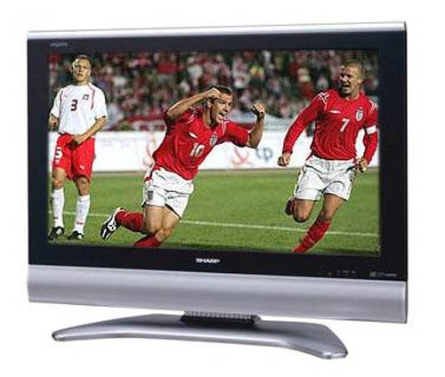 Sharp Aquos LC-32GD8E 32-inch LCD television displaying a football match with players in action.