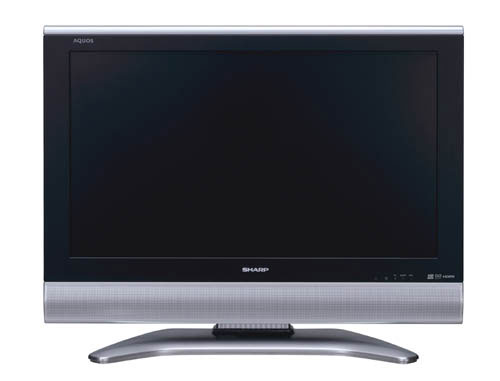 Sharp Aquos LC-32GD8E 32-inch LCD television on a stand with power button illuminated, black screen, silver speakers at the bottom, and Sharp logo centered beneath the screen.