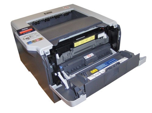 Brother HL-5270DN laser printer with open front cover showing toner cartridge and internal components.