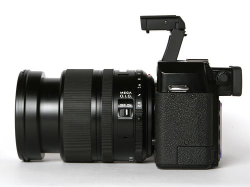 Panasonic DMC-L1 Digital SLR camera with Leica lens and articulated LCD screen displayed against a white background.