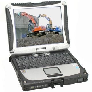 Panasonic ToughBook CF-19 rugged laptop with touchscreen display showing an image of excavators at a construction site.