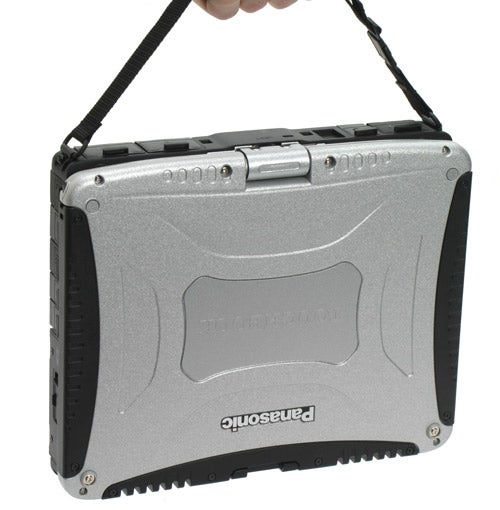 Panasonic ToughBook CF-19 rugged laptop with carry handle displayed against a white background.
