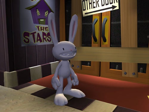 Screenshot of Max, the hyperkinetic rabbity thing, from the video game Sam & Max: Culture Shock, standing in an office with a poster of 'The Stars' and a door labeled 'Other Door' in the background.