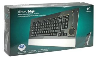 Box packaging for Logitech diNovo Edge keyboard with product image and features highlighted in English and Dutch, indicating a slim profile design and TouchDisc technology.