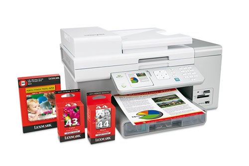 Lexmark X9350 all-in-one printer with scanner, alongside Lexmark color and black ink cartridges, and a printed color graph.