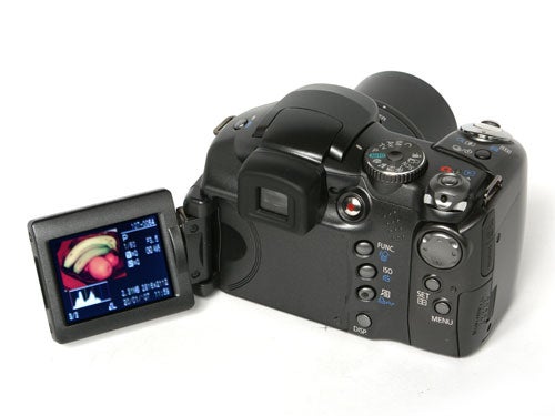 A Canon PowerShot S3 IS digital camera with its articulated LCD screen displayed, showing an image preview.