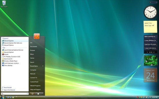Screenshot of the Windows Vista desktop interface showing the start menu, taskbar, desktop icons, and gadgets including a clock and calendar.