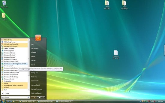 Screenshot of Windows Vista desktop with Start menu open, displaying the default green aurora background and icons for commonly used programs.