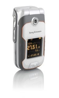 Sony Ericsson W710i mobile phone displayed upright with fitness application screen showing speed, time, and distance on a reflective surface.