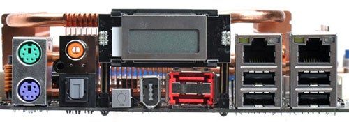 Rear I/O panel of Asus Striker Extreme motherboard showing PS/2 ports, USB ports, eSATA, Ethernet ports, and audio jacks.
