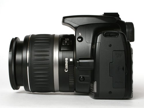 Canon EOS 400D digital SLR camera with attached lens, displayed on a white background.