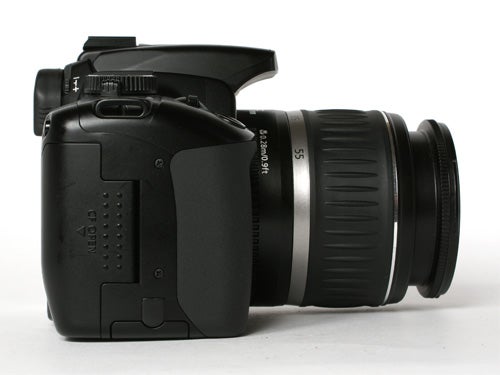 Canon EOS 400D DSLR camera with a standard zoom lens attached, positioned on a white background.