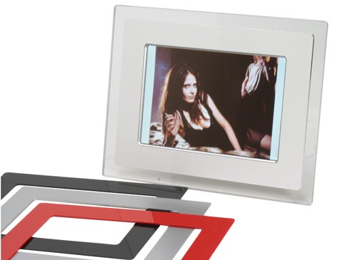Philips 9-inch Digital Photo Frame 9FF2M4 displayed with interchangeable red, black, and grey framing options, showing a sample image on screen.