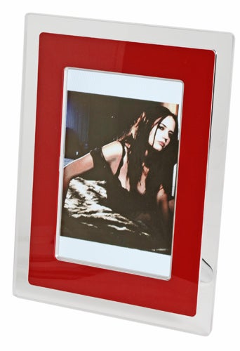 Philips 9-inch Digital Photo Frame 9FF2M4 with red border displaying a photograph of a person.