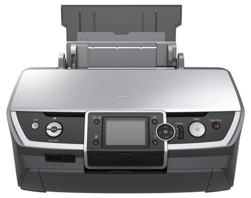 Epson Stylus Photo R360 inkjet printer with open input and output trays, featuring a front control panel with buttons and a small LCD screen.