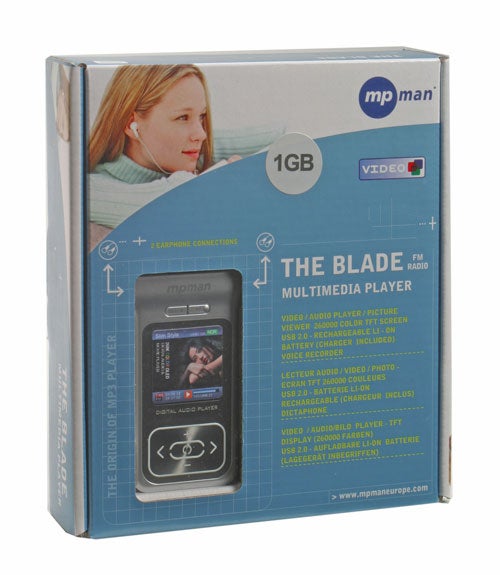 MPMan The Blade multimedia player packaging, highlighting its features including 1GB storage, video and audio playability, picture viewing, a built-in FM radio, earphone connections, and a rechargeable battery.
