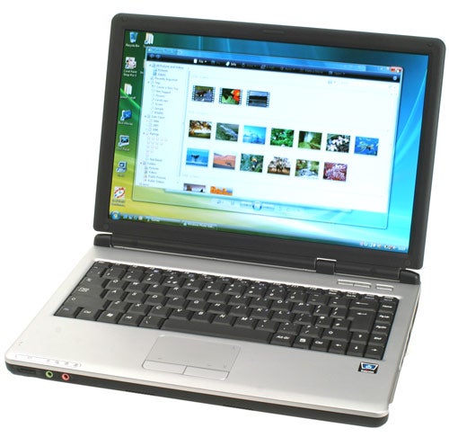 Laptop computer with an open screen displaying a photo viewer application with multiple images, set on a plain background.