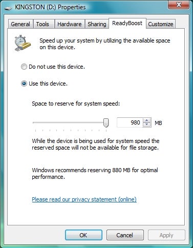 Screenshot displaying the ReadyBoost tab in the properties menu for Kingston 1GB DataTraveler USB flash drive with the option selected to use the device, and a slider adjusted to reserve 980 MB for system speed.