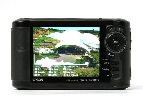 Epson P-5000 Multimedia Storage Viewer with a 4-inch Photo Fine Ultra screen displaying a colorful landscape photograph, showing the device's interface and controls.