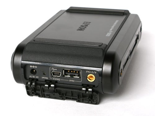 Epson P-5000 Multimedia Storage Viewer showing its connectivity ports including USB, A/V out, and card slots on a white background.