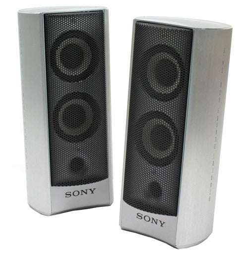 Sony SRS-DZ10 2.1 speaker set featuring two silver vertical speakers with black speaker grills displaying the Sony logo on the bottom front.