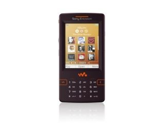 Sony Ericsson W950i mobile phone displaying its music player interface with album covers on a white background.