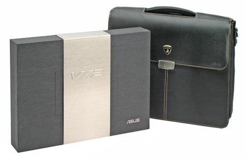 Asus Lamborghini VX2 laptop packaging with branded carrying case. The box has a metallic finish with the VX2 logo, and the black leather carrying case features the Lamborghini emblem and yellow stitching accents.