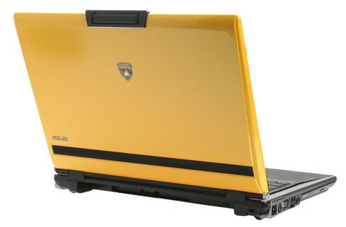 Yellow and black Asus Lamborghini VX2 laptop with lid open and the Lamborghini logo displayed on the back.