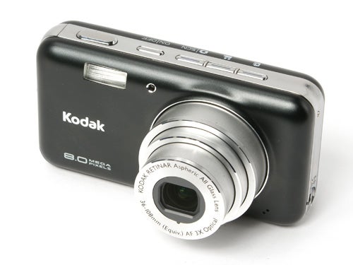 Kodak EasyShare V803 camera with lens extended, 8.0 megapixels label, and flash visible on a white background.