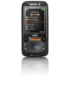 Sony Ericsson W850i mobile phone with Walkman music player interface on display, reflecting on a glossy surface.