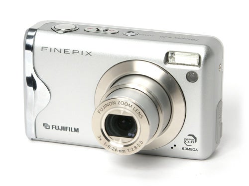 Fujifilm FinePix F20 digital camera displayed against a white background, featuring a retractable lens, built-in flash, and marked with 6.3 mega pixels resolution.