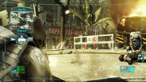 Screenshot from the video game Tom Clancy's Ghost Recon Advanced Warfighter 2 showing a first-person view where the player is behind cover with a heads-up display (HUD) visible, a squad mate visible on the right, and urban combat scenery with a destroyed vehicle in the background.