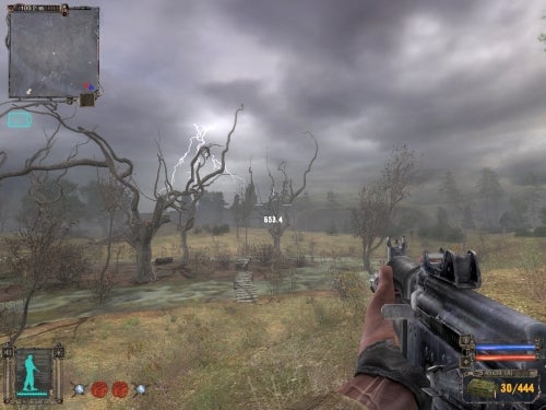 First-person view in S.T.A.L.K.E.R: Shadow of Chernobyl video game showcasing a character's hand holding a gun with the game's heads-up display, including a health bar, mini-map, and ammo count, with a stormy, desolate landscape with dead trees and lightning in the background.
