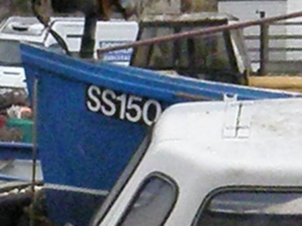 Blue boat with registration number 