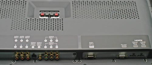 Close-up of the rear panel on a Fujitsu Plasmavision P42XHA58 42-inch Plasma TV showing various input and output ports including HDMI, component, and audio connections.