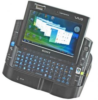 Sony Micro PC Vaio VGN-UX1XN handheld computer displayed with screen showing the Windows operating system, full QWERTY keyboard, and various control buttons and ports visible.