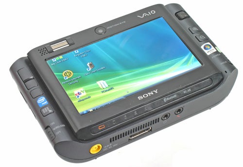 Sony Micro PC Vaio VGN-UX1XN handheld computer with Windows operating system on screen, featuring a QWERTY keyboard, multiple ports, and control buttons.