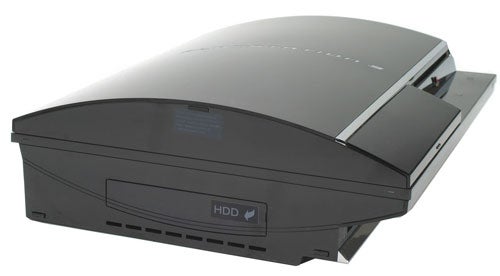 Sony PlayStation 3 gaming console with a partially ejected disc tray, featuring a sleek black design and the HDD indicator on the front.