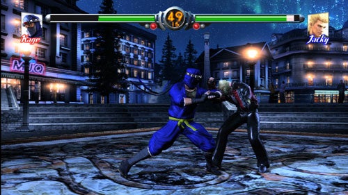 Screenshot of a Virtua Fighter 5 game match showing two characters, Kage and Jacky, in combat on a nighttime outdoor stage with a life bar at the top indicating the match has just started.