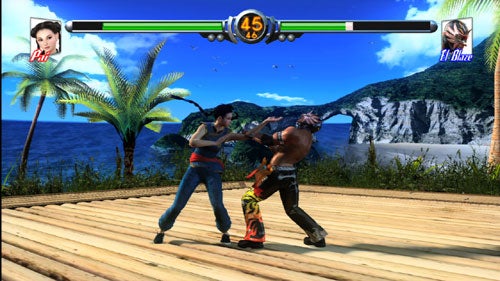 Screenshot from the video game Virtua Fighter 5 showing two characters, Pi and El Blaze, engaged in a fight on a wooden platform with a tropical beach scene in the background. The health bars and timer are displayed at the top of the screen.