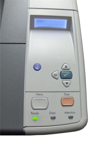 Control panel of the HP LaserJet P3005x printer featuring a blue backlit LCD screen and buttons for menu navigation and printer functions such as stop, data, and attention indicators.