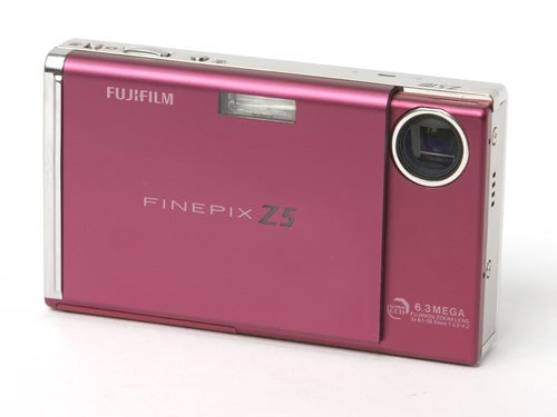 Fujifilm FinePix Z5fd digital camera in metallic pink with a 6.3-megapixel sensor label, displayed on a white background.