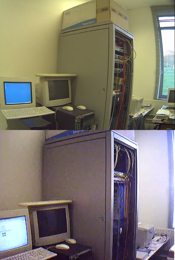 Two images displayed vertically showing a server room with a tall server rack, computers, and cables from the perspective of the Axis 207MW Wireless Network Camera. The top image captures the server room with normal lighting, while the bottom image appears to be taken in lower light conditions, demonstrating the camera's performance under different lighting scenarios.