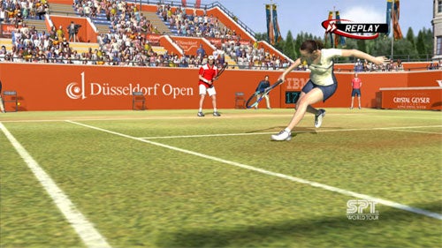 Screenshot from the Virtua Tennis 3 video game showing two players on a clay court during the Dusseldorf Open with a replay banner visible.