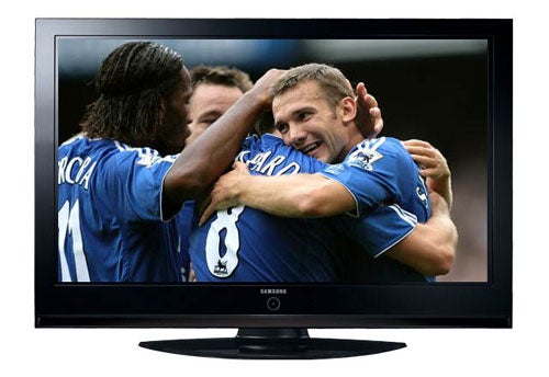 Samsung PS-42P7HD 42-inch Plasma TV displaying a football match with players celebrating a goal.