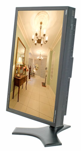 NEC MultiSync LCD2690WUXi monitor displaying a high-resolution image of an elegant hallway with a chandelier, reflecting its color accuracy and sharp image quality.